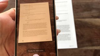 Scanning a document on your iPhone in the Notes app.