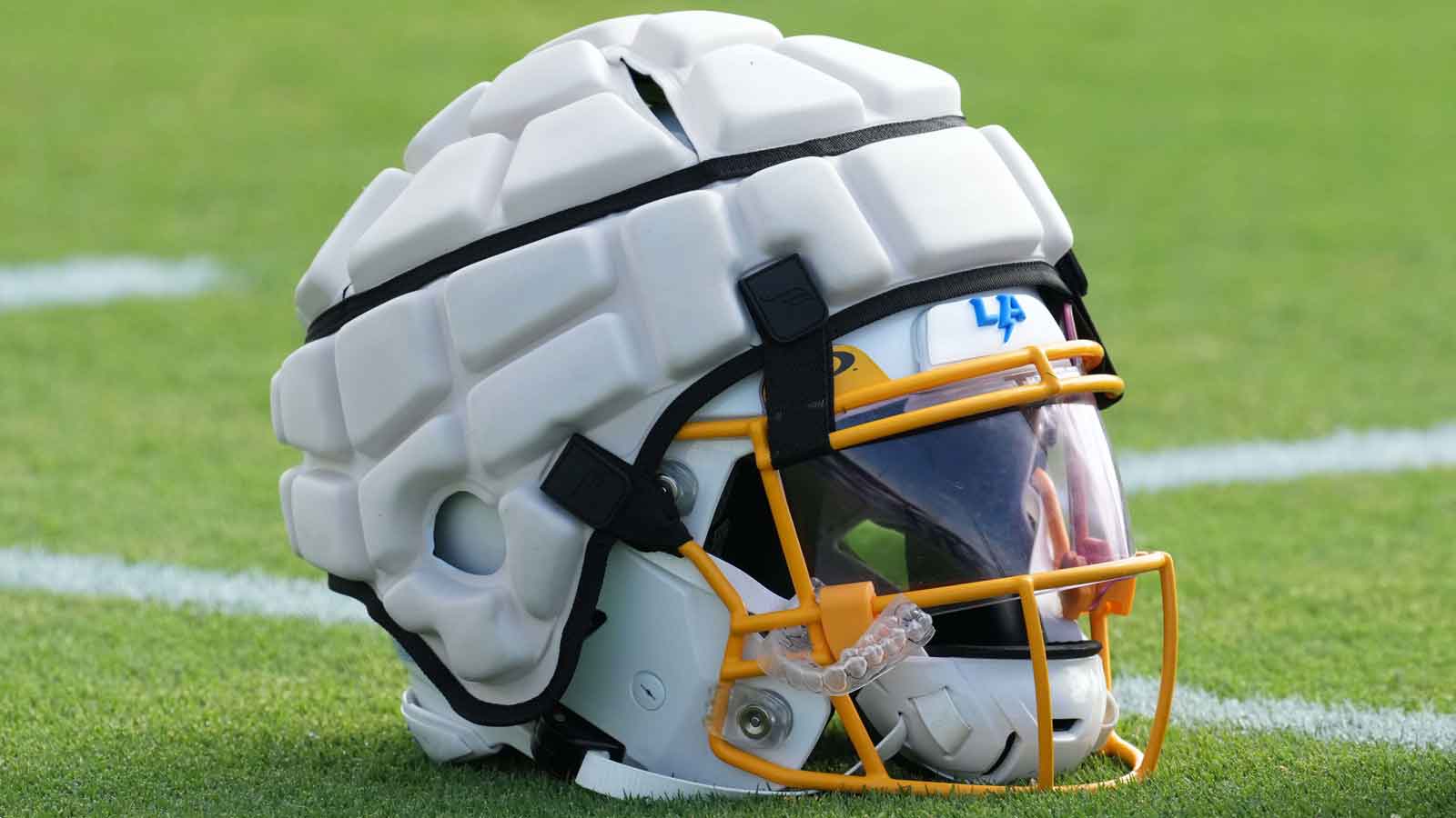 football under helmet cap