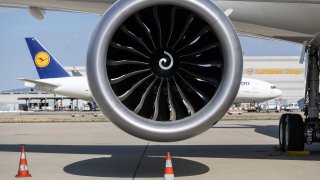 The Lufthansa Boeing 787-9 aircraft stands on its parking position at Frankfurt Airport, with another Lufthansa aircraft in the background. The first Boeing 787-9 jet landed at its new home base in Frankfurt.