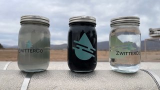 The water in the jar on the left is wasterwater before being put through ZwitterCo’s filtration membrane. The jar on the right is water cleaned and ready for reuse. The jar in the middle is the concentrate of waste that has been pulled out of the water with the filtration system and can be used in to make other products, like fertilizer of feestock, which can be sold.