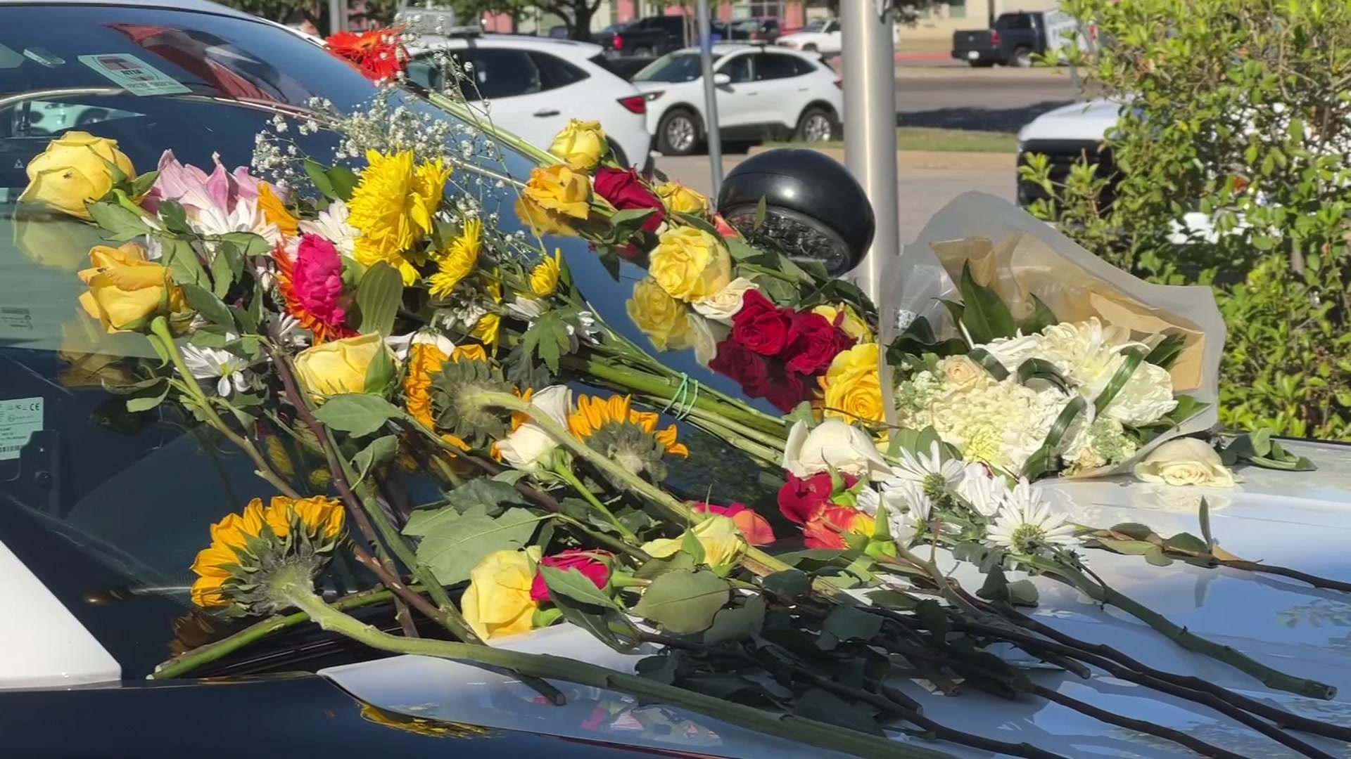 Cruiser Outside Dallas Police Station Becomes Memorial For Officer Killed In Wrong Way Crash