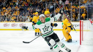 Mason Marchment #27 of the Dallas Stars celebrates his goal against Juuse Saros #74 of the Nashville Predators during an NHL game at Bridgestone Arena on October 13, 2022 in Nashville, Tennessee.