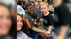 A Photo of a Coal Miner Dad Covered in Soot With His Son at Basketball Game Goes Viral