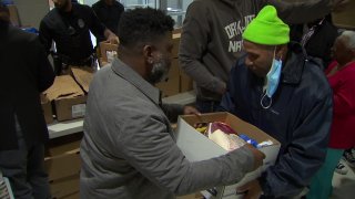 Dallas ISD trustee Maxie Johnson hosted a thanksgiving dinner giveaway at South Oak Cliff High School on Wednesday night.