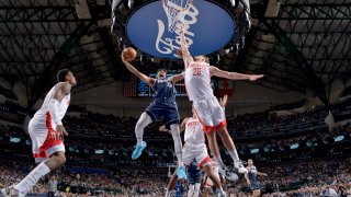 Christian Wood #35 of the Dallas Mavericks drives to the basket against the Houston Rockets on November 16, 2022 at the American Airlines Center in Dallas, Texas.