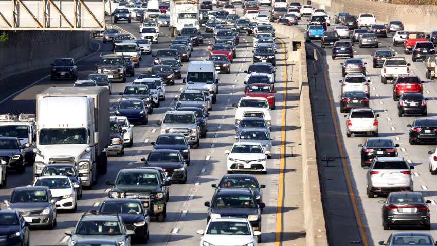 Heavy traffic moves along the 101 freeway on Wednesday morning on November 23, 2022 in Los Angeles, California.