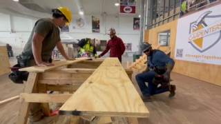 Training and hands-on carpentry work in a classroom setting.