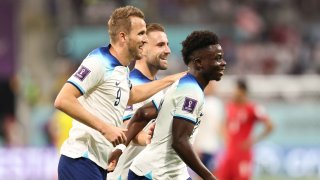 Bukayo Saka of England celebrates after scoring his side’s fourth goal with Harry Kane during the FIFA World Cup Qatar 2022 Group B match between England and IR Iran at Khalifa International Stadium on November 21, 2022 in Doha, Qatar.