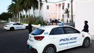 Police block the road in front of the Magistrate Court building where Sam Bankman-Fried will appear before the Chief Magistrate today. Bankman-Fried, who founded and led FTX until a liquidity crunch forced the cryptocurrency exchange to declare bankruptcy last month, was arrested after being criminally charged by U.S. prosecutors, in Nassau, Bahamas December 13, 2022.
