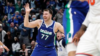 DALLAS, TEXAS – DECEMBER 27: Luka Doncic #77 of the Dallas Mavericks reacts after making the game tying basket against the New York Knicks with one second left in regulation to send the game to overtime at American Airlines Center on December 27, 2022 in Dallas, Texas.