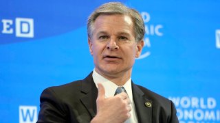 FBI Director Christopher Wray talks at the World Economic Forum in Davos, Switzerland, on Jan. 19, 2023.