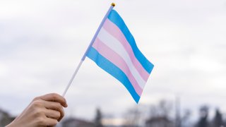 Transgender Flag hold in the sky