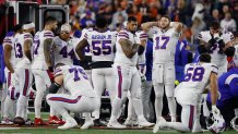 CINCINNATI, OHIO - JANUARY 02: Buffalo Bills players react after teammate Damar Hamlin #3 was injured against the Cincinnati Bengals during the first quarter at Paycor Stadium on January 02, 2023 in Cincinnati, Ohio. (Photo by Kirk Irwin/Getty Images)