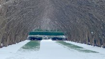 Crape Myrtle Alley covered in ice and snow at the Dallas Arboretum, Jan. 31, 2023.