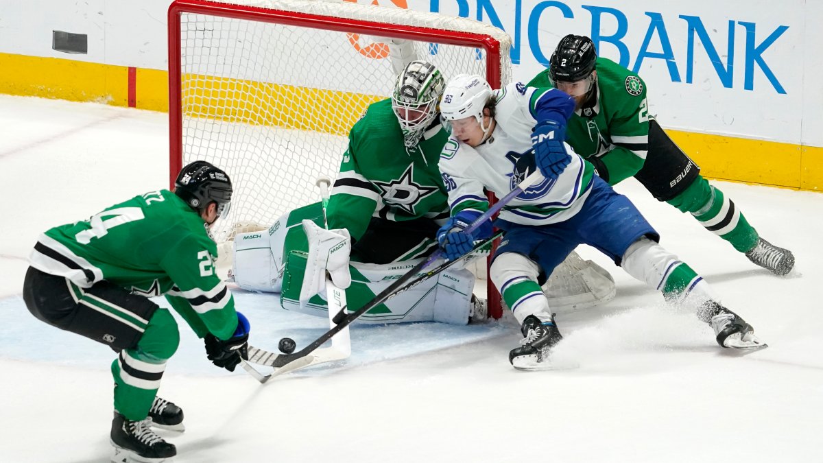 Conor Garland's 3 goals lead Canucks to OT win over Coyotes