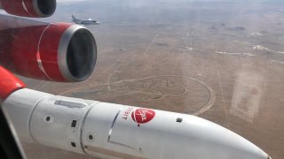 Virgin Orbit flew its modified Boeing 747 airplane “Cosmic Girl” with the company’s LauncherOne rocket under its wing for the first time on November 18, 2018.