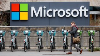 Velib bicycles are parked in front of the the U.S. computer and micro-computing company headquarters Microsoft on January 25, 2023 in Issy-les-Moulineaux, France.