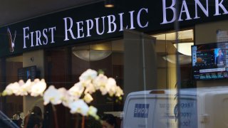 People are seen inside the First Republic Bank branch in Midtown Manhattan in New York City, New York, U.S., March 13, 2023. REUTERS/Mike Segar