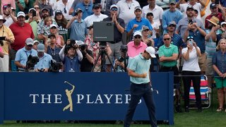 Scottie Scheffler reacts after hitting from the 17th tee during the final round of The Players Championship golf tournament, Sunday, March 12, 2023, in Ponte Vedra Beach, Fla.