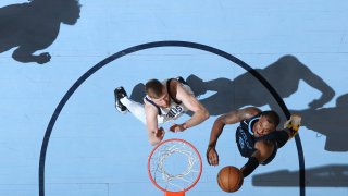 MEMPHIS, TN – MARCH 11: Xavier Tillman #2 of the Memphis Grizzlies drives to the basket during the game against the Dallas Mavericks on March 11, 2023 at FedExForum in Memphis, Tennessee. NOTE TO USER: User expressly acknowledges and agrees that, by downloading and or using this photograph, User is consenting to the terms and conditions of the Getty Images License Agreement. Mandatory Copyright Notice: Copyright 2023 NBAE (Photo by Joe Murphy/NBAE via Getty Images)