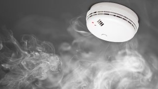 smoke detector of fire alarm in action