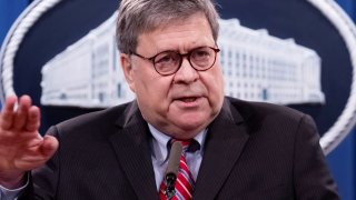 US Attorney General William Barr participates in a news conference to provide an update on the investigation of the bombing of Pan Am flight 103 on the 32nd anniversary of the attack, at the US Department of Justice in Washington, D.C, December 21, 2020.
