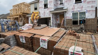 Stacks of bricks outside a home under construction in the CastleRock Communities Sunfield residential development in Buda, Texas, U.S., on Wednesday, May 15, 2021.