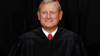 U.S. Supreme Court Chief Justice John G. Roberts poses during a group portrait at the Supreme Court in Washington, U.S., October 7, 2022. 