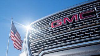 A GMC pickup truck is displayed for sale on a lot at a General Motors dealership on January 05, 2023 in Austin, Texas.