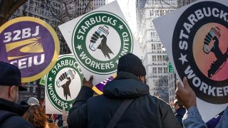 Members of a recently formed union of Starbucks workers hold a rally to celebrate the first anniversary of their founding, December 9, 2022 in New York City.