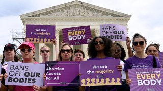 Abortion rights advocates rally outside the US Supreme Court on April 14, 2023, in Washington, DC, speaking out against abortion pill restrictions.