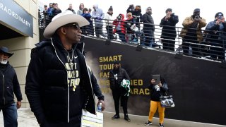 University of Colorado Buffaloes head coach Deion Sanders takes the field for warmups before the Black and Gold game at Folsom Field on April 22, 2023.