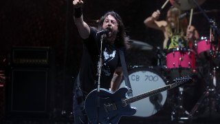File - Dave Grohl and Taylor Hawkins of Foo Fighters perform at The Innings Festival 2022 at Tempe Beach Park on February 26, 2022 in Tempe, Arizona.