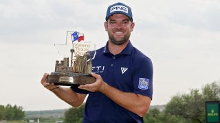 Corey Conners of Canada poses with the trophy after winning the Valero Texas Open at TPC San Antonio on April 02, 2023 in San Antonio, Texas.