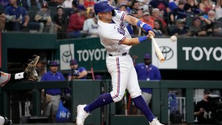 Josh Jung #6 of the Texas Rangers hits a two-run home run during the sixth inning against the Baltimore Orioles at Globe Life Field on April 05, 2023 in Arlington, Texas. (Photo by Sam Hodde/Getty Images)
