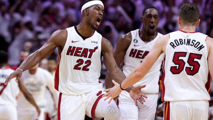 MIAMI, FLORIDA – APRIL 24: Jimmy Butler #22, Bam Adebayo #13 and Duncan Robinson #55 of the Miami Heat celebrate during the fourth quarter against the Milwaukee Bucks in Game Four of the Eastern Conference First Round Playoffs at Kaseya Center on April 24, 2023 in Miami, Florida. NOTE TO USER: User expressly acknowledges and agrees that, by downloading and or using this photograph, User is consenting to the terms and conditions of the Getty Images License Agreement. (Photo by Megan Briggs/Getty Images)