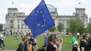 Activists demanding the legalization of marijuana march past the Reichstag during the annual Hemp Parade in Berlin, Germany.