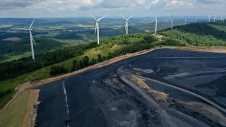 Wind turbines and coal photographed in Maryland, United States.