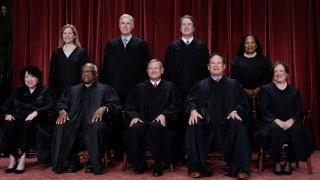 Members of the Supreme Court sit for a group portrait