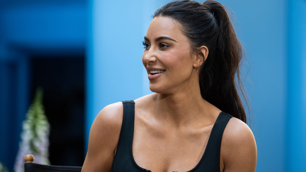Kim Kardashian brings 'world's most expensive handbag' to a soccer