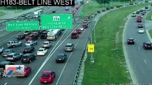 The view from the Texas Department of Transportation camera on S.H. 183 at Belt Line Rd. shows traffic backed up as police investigate an officer-involved shooting.