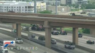 A crash is cleared along Interstate 35W northbound, May 11, 2023.