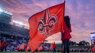 A view of a University of Louisiana at Lafayette flag.