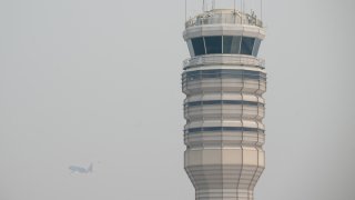 A Southwest Boeing 737 airplane takes off into a smoke haze from Ronald Reagan Washington National Airport in Arlington, Virginia, June 8, 2023, as smoke from wildfires in Canada blankets the area.