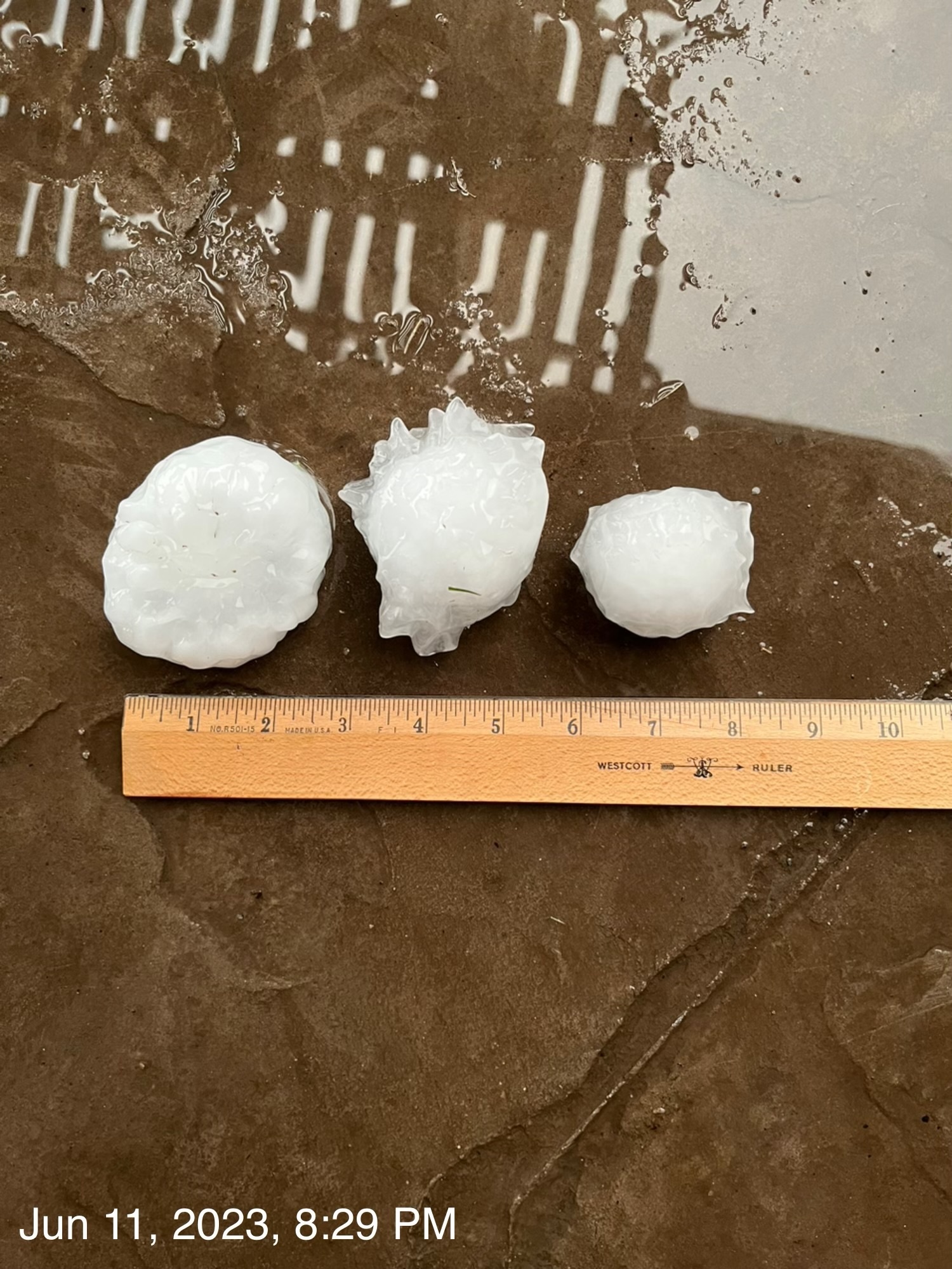 Largest hail here in many years. Baseball size hail in Double Oak TX