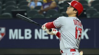 Los Angeles Angels’ Shohei Ohtani watches his two-run home run in the eighth inning in a baseball game against the Texas Rangers, Thursday, June 15, 2023, in Arlington, Texas.