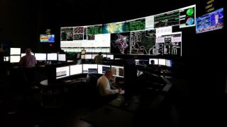 System operators work in the command center of the Electric Reliability Council of Texas in Taylor. About 90 percent of Texas’ electric load is managed by ERCOT.