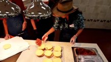 NBC News correspondent Kathy Park was "an honorary pitmaster" for the day, pitching in to make Buc-ee's signature barbecue sandwiches.