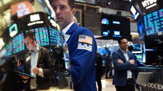 Traders work the floor of the New York Stock Exchange, May 31, 2023.