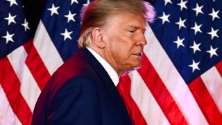 Former US President and 2024 Republican Presidential hopeful Donald Trump gestures about weight lifting as he speaks at a Republican volunteer recruitment event at Fervent, a Calvary Chapel, in Las Vegas, Nevada, July 8, 2023.